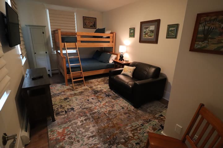 Downstairs bedroom #1. Twin over full bunk bed, pull out twin and tv. 