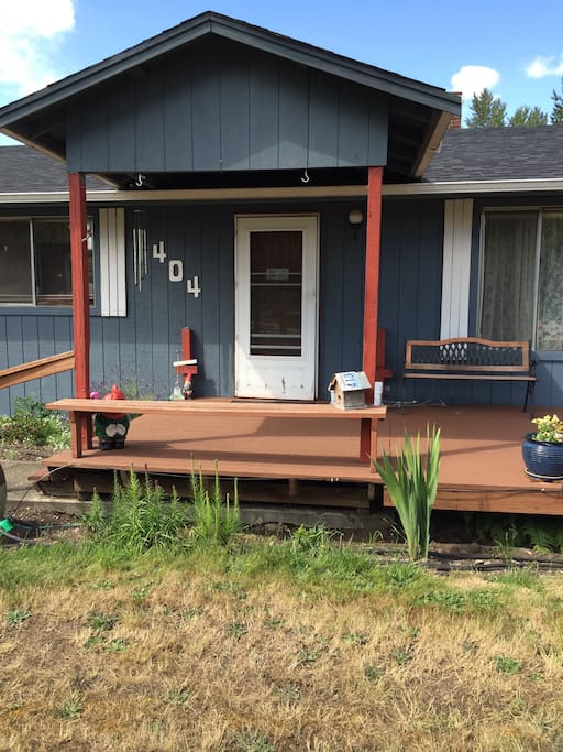 Front deck. Entry door.