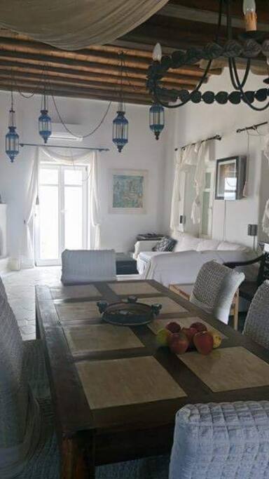 living room with an angled white sofa