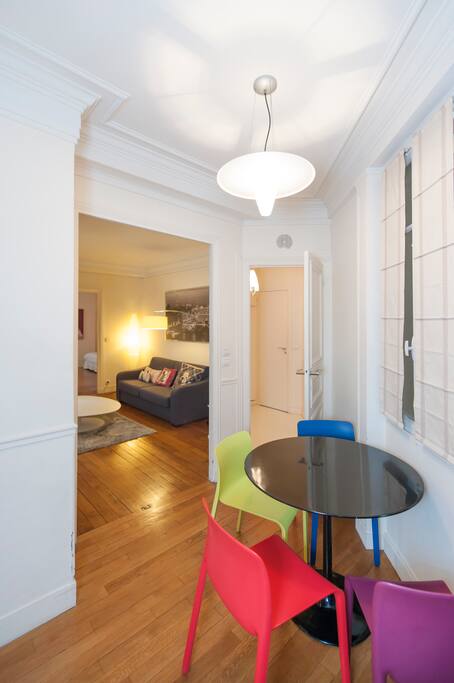 Entrance with dining table and kitchen on your left