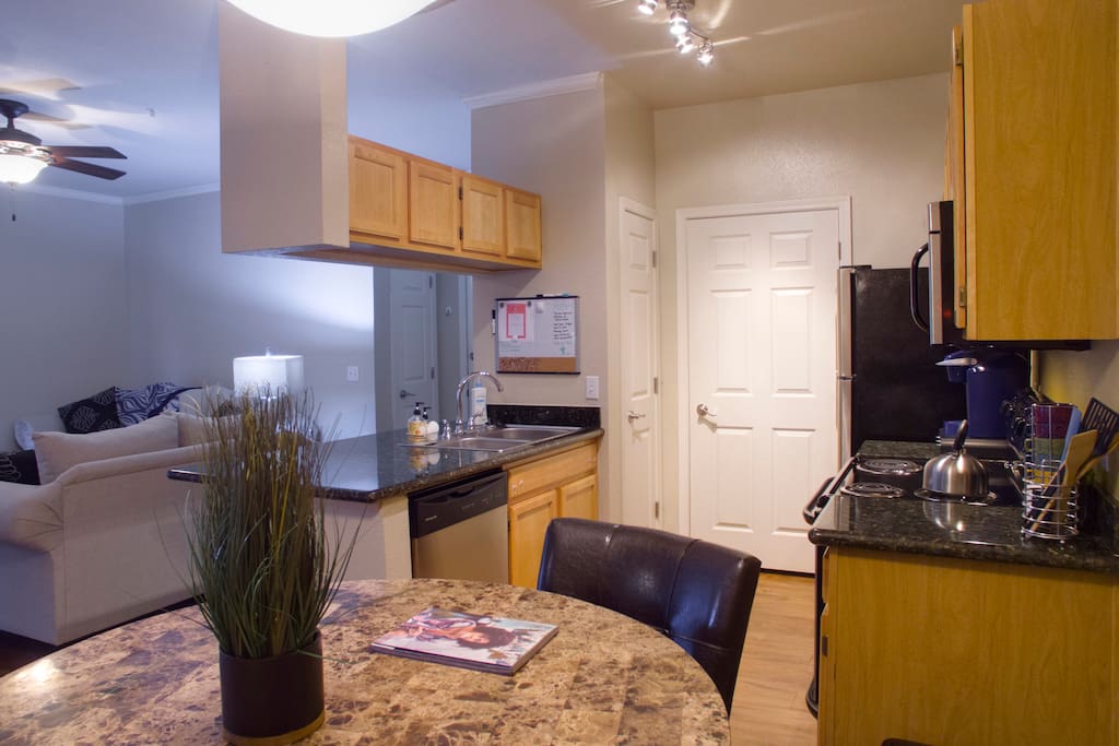 Spacious, open kitchen with interior laundry.