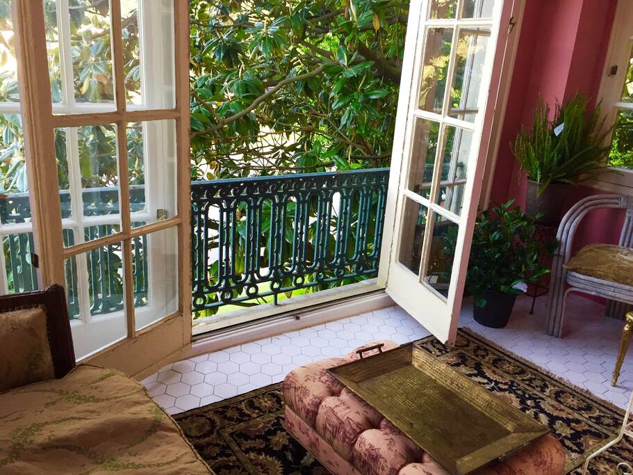 Solarium connected to both the living room and master bedroom. Lovely magnolia trees in window view.