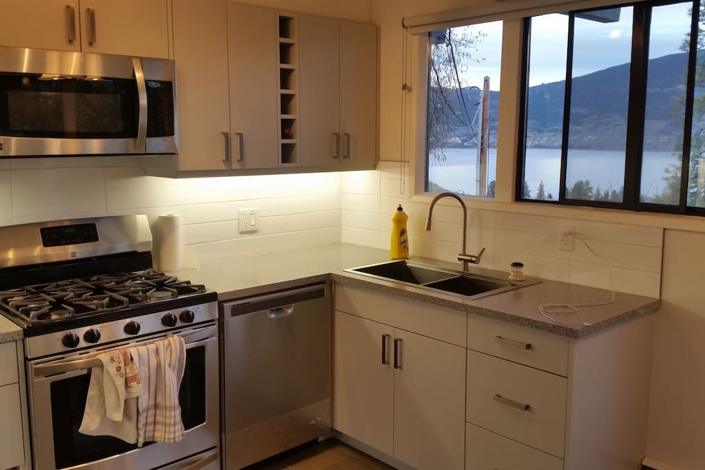 Brand new custom kitchen including wine rack for easy access to your favorite bottles