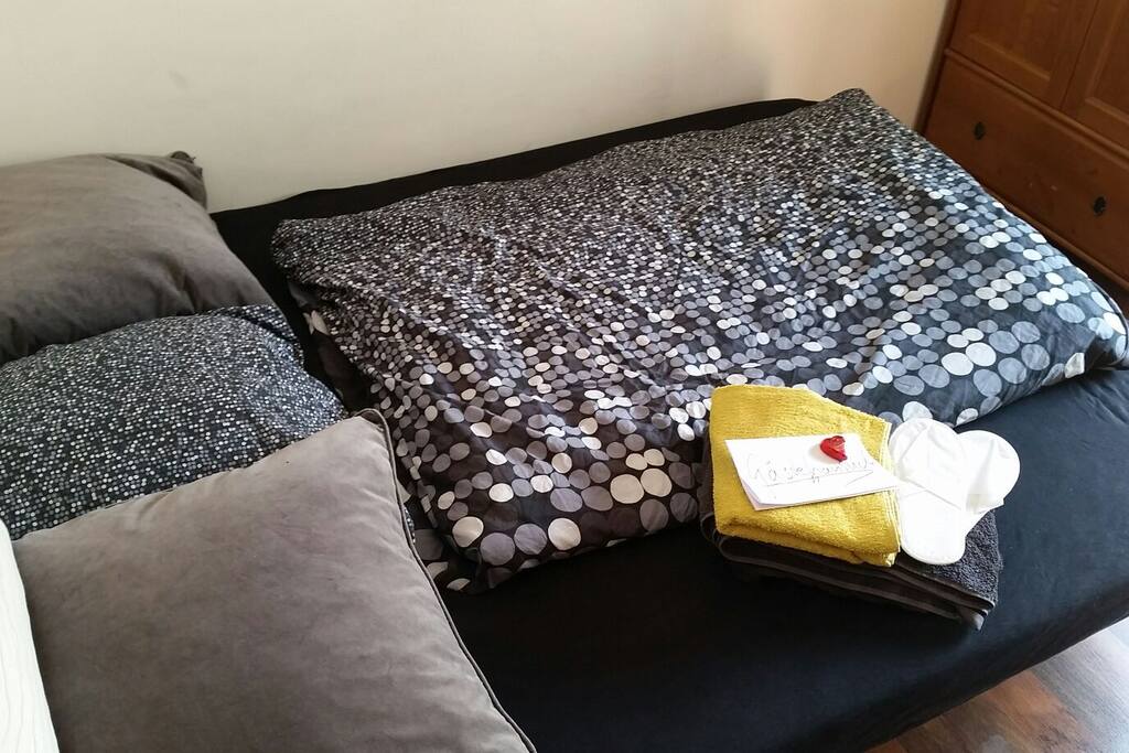 a bed and something sweet
