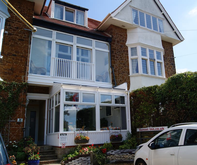Front of house with our breakfast room