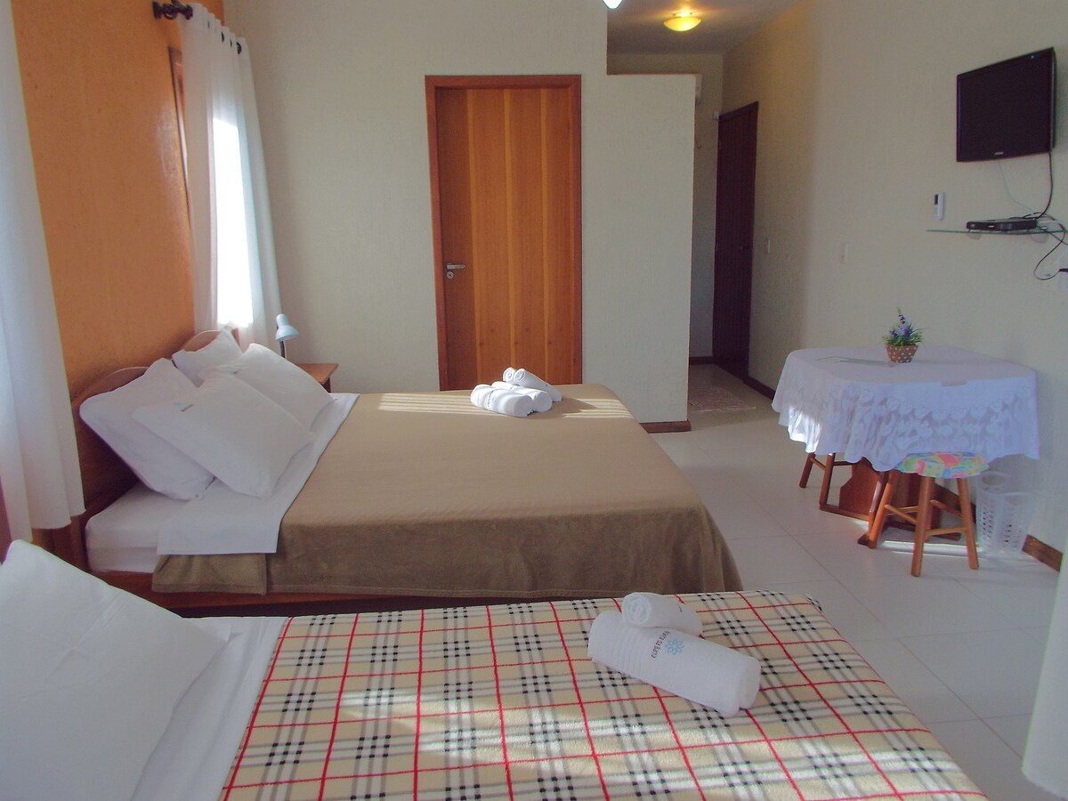 Indoor view with joined beds
Back door is the bathroom 