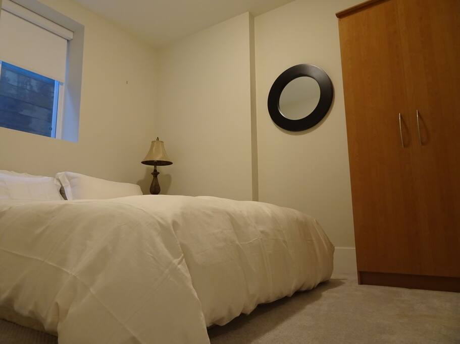 Bedroom with queen size bed.