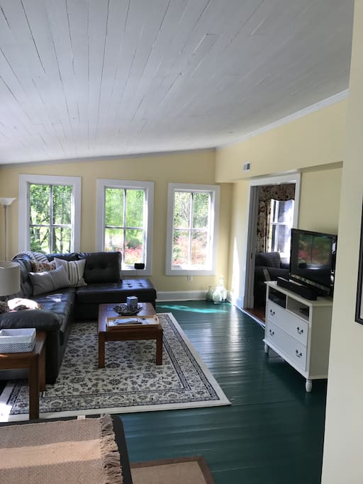 Sunroom adjacent to modern kitchen