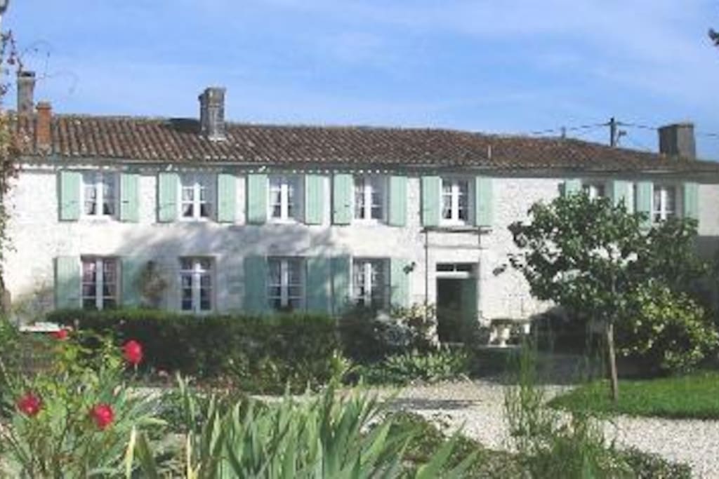 Typical Charentais farmhouse in village