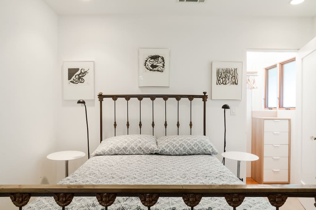 Full sized bed. The antique cast iron full size bed has cast angel faces.