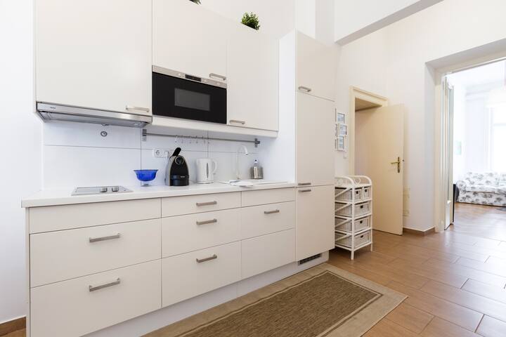 Elegant living 2+2+2, historic building, renovated gallery image 4