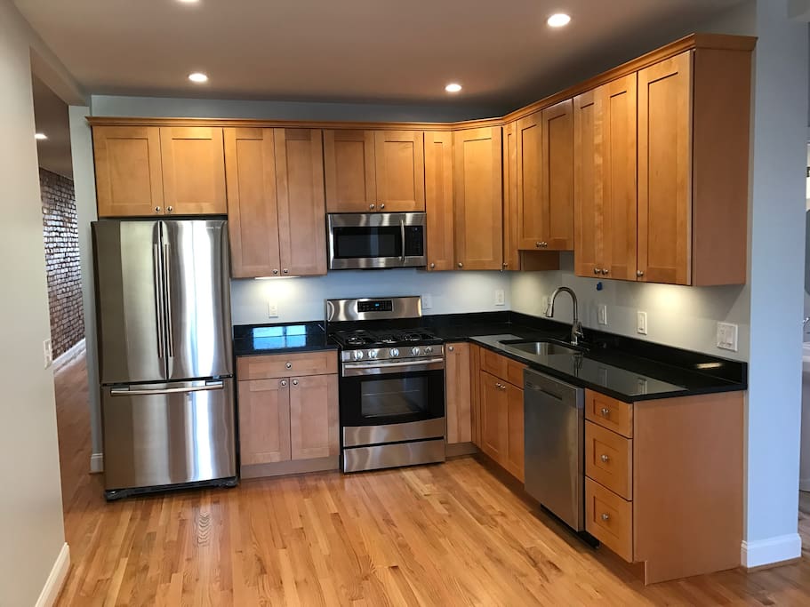 Open floor kitchen with all new appliances after new renovation.