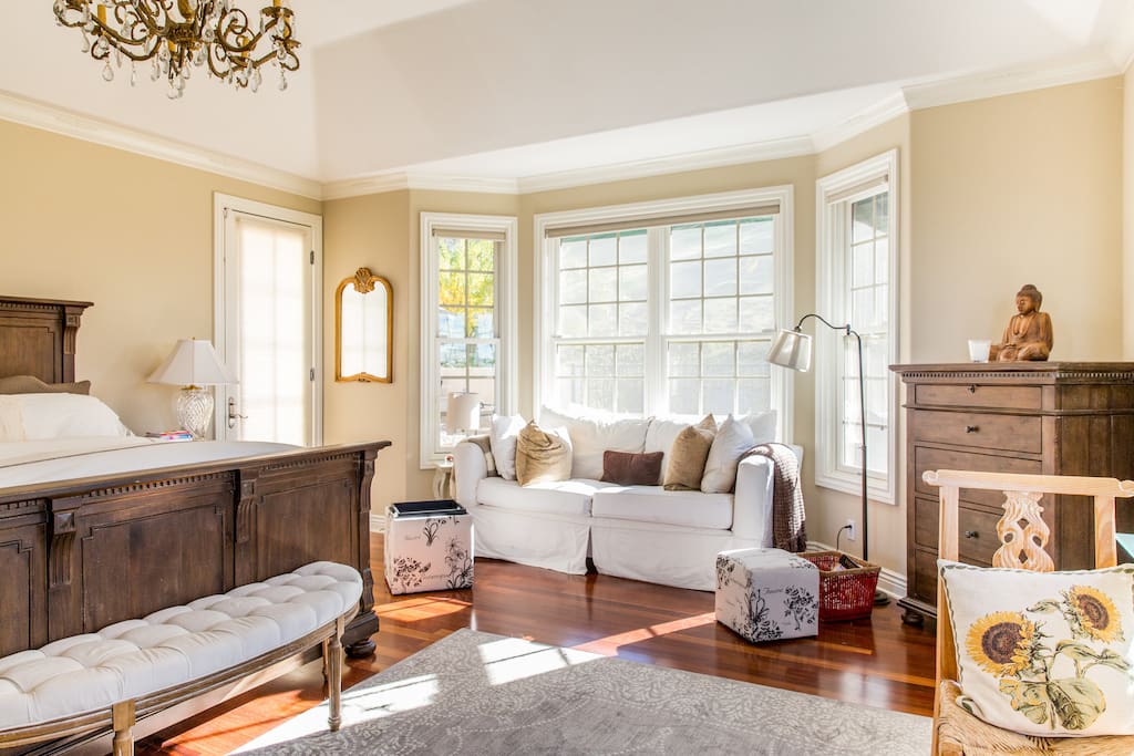 Master suite is expansive with seating area for relaxing in total privacy