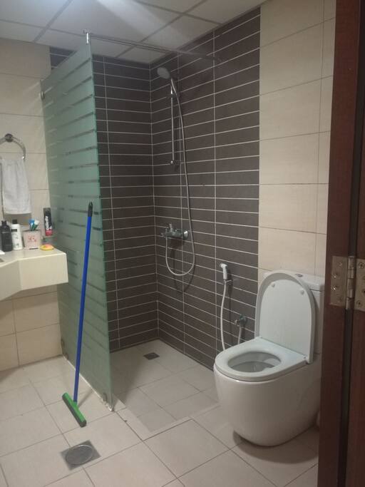 clean attached washroom with room