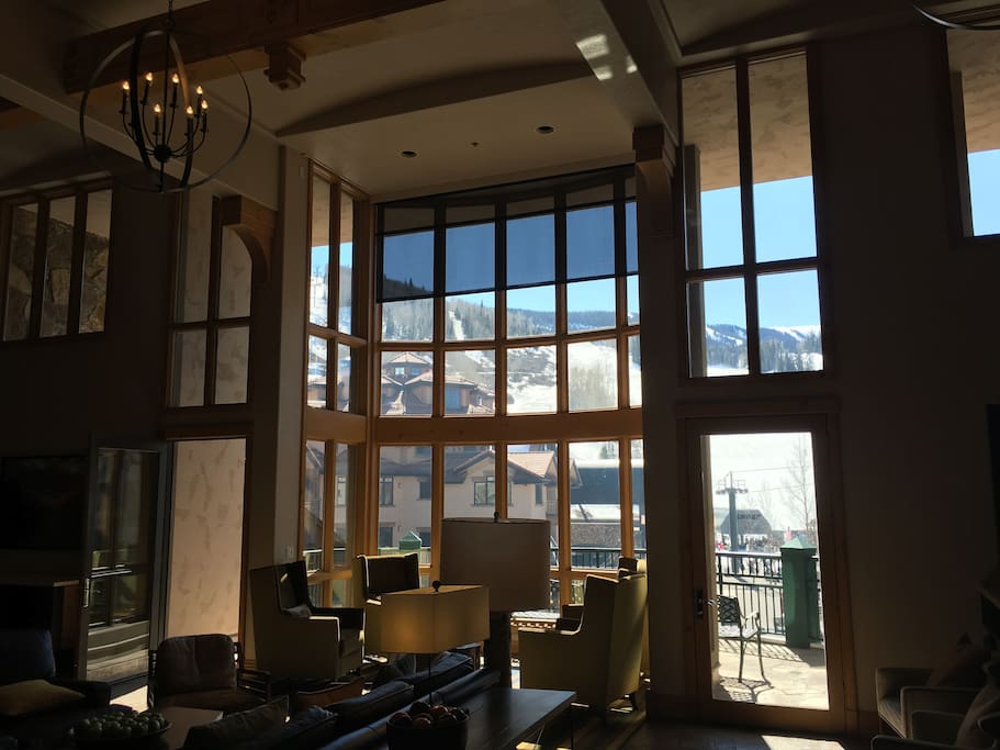 Property great room with roaring fireplace for your relaxation