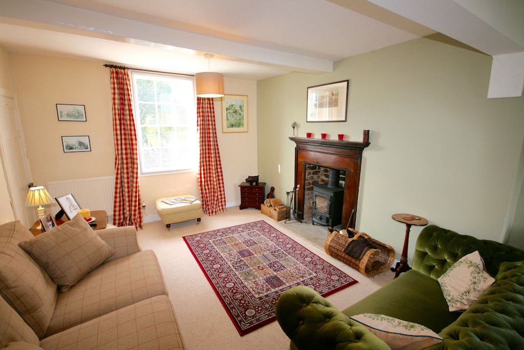 Sitting room with log burner.