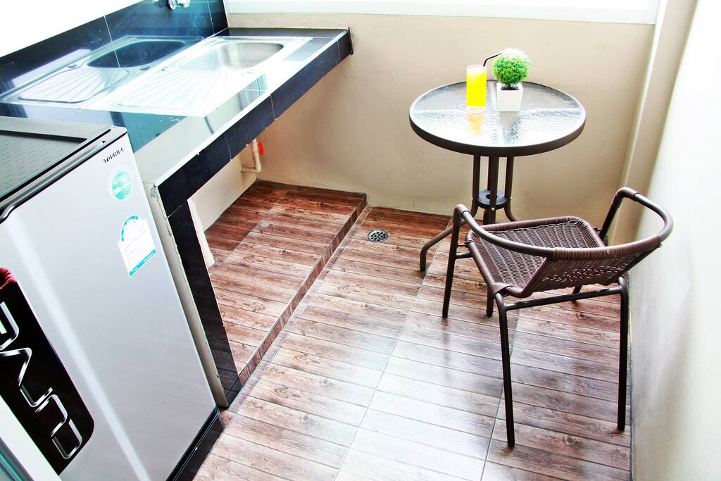balcony and big refrigerator