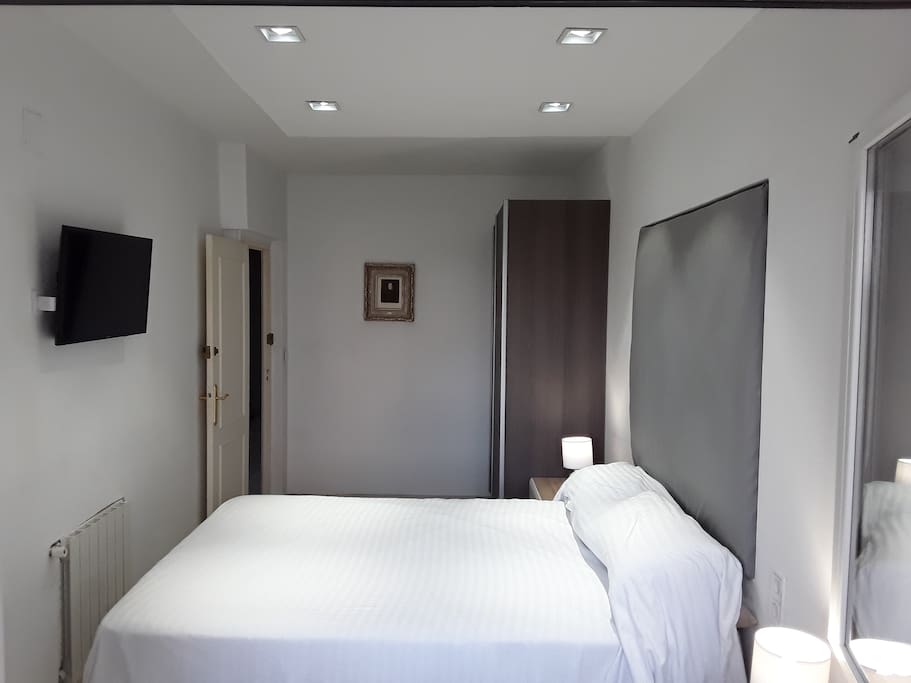 Master bedroom with closet - plus 45"/114 cm Smart TV, quite (sound proofed - for those lazy mornings) Each room has it's own Air Conditioner unit.