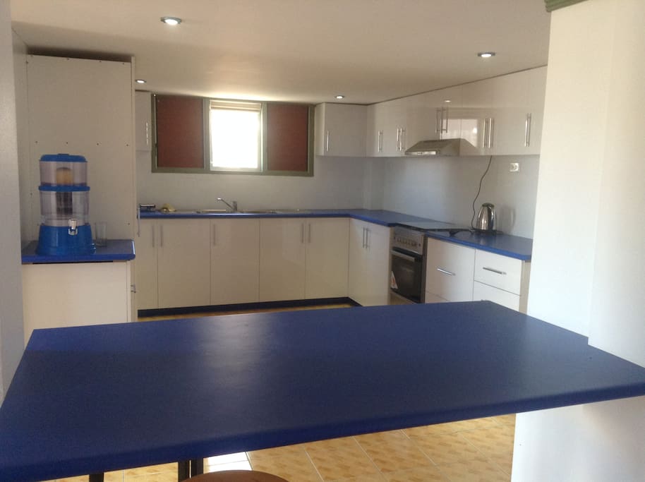 Spacious kitchen with breakfast bar.
