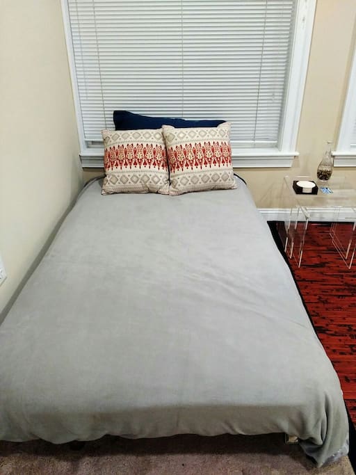 Sofa converts to twin bed with memory foam mattress