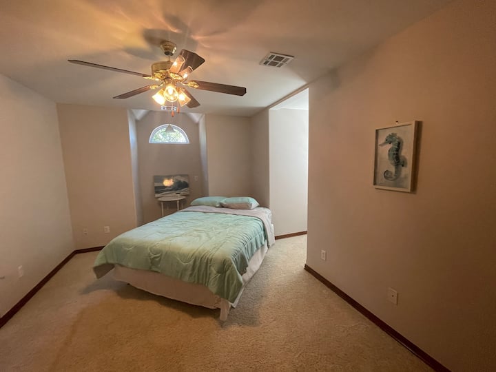 Upstairs Bedroom.  This bed is a new pillowtop queen size bed.  Full closet and bathroom in this room. Shower and toilet.