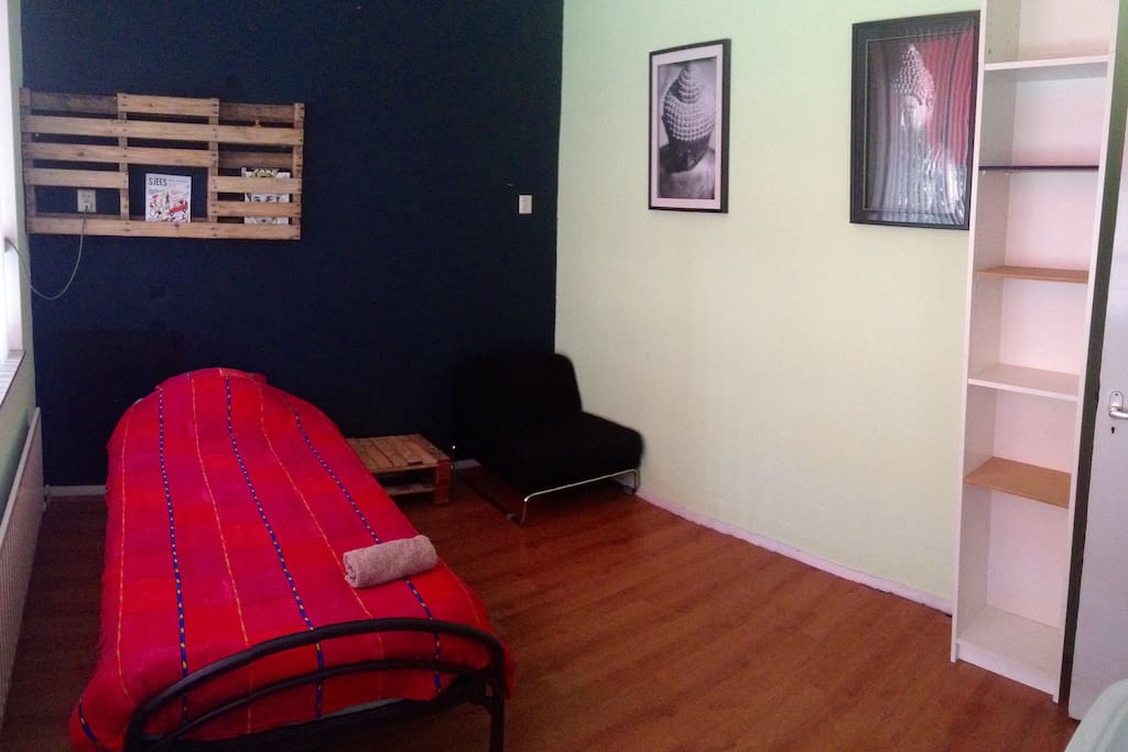 BEDROOM - The spacious bedroom on the first floor of the house with a single bed