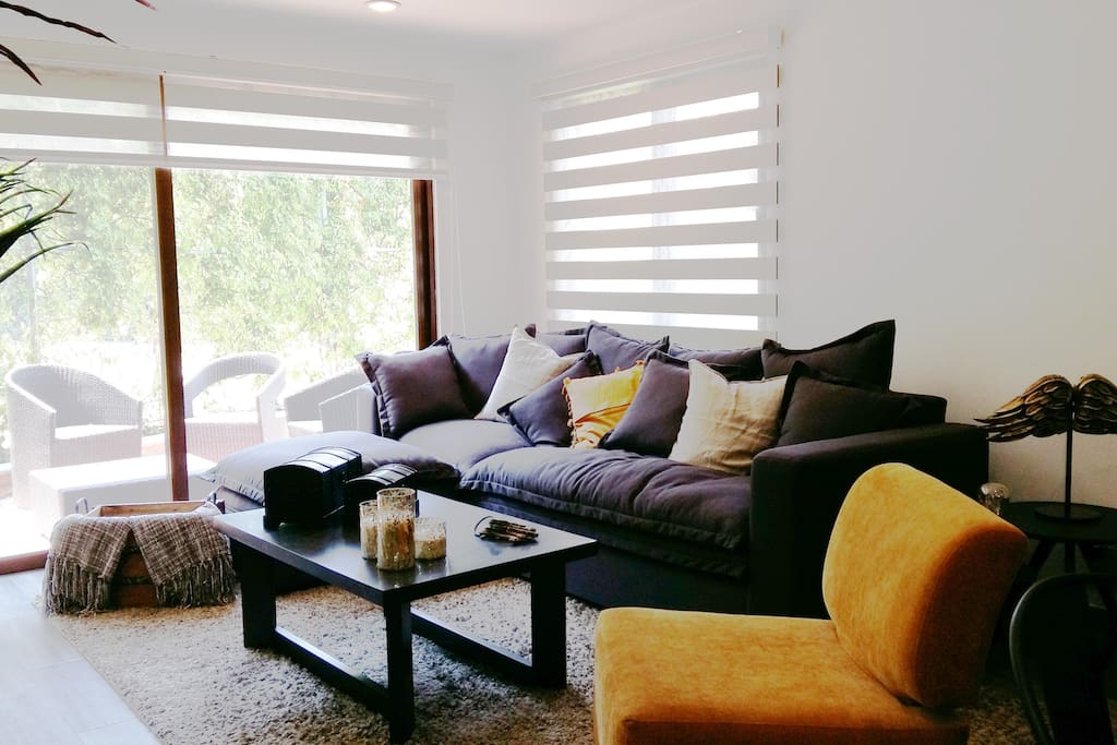 Living room equipped with cable TV and furnished terrace