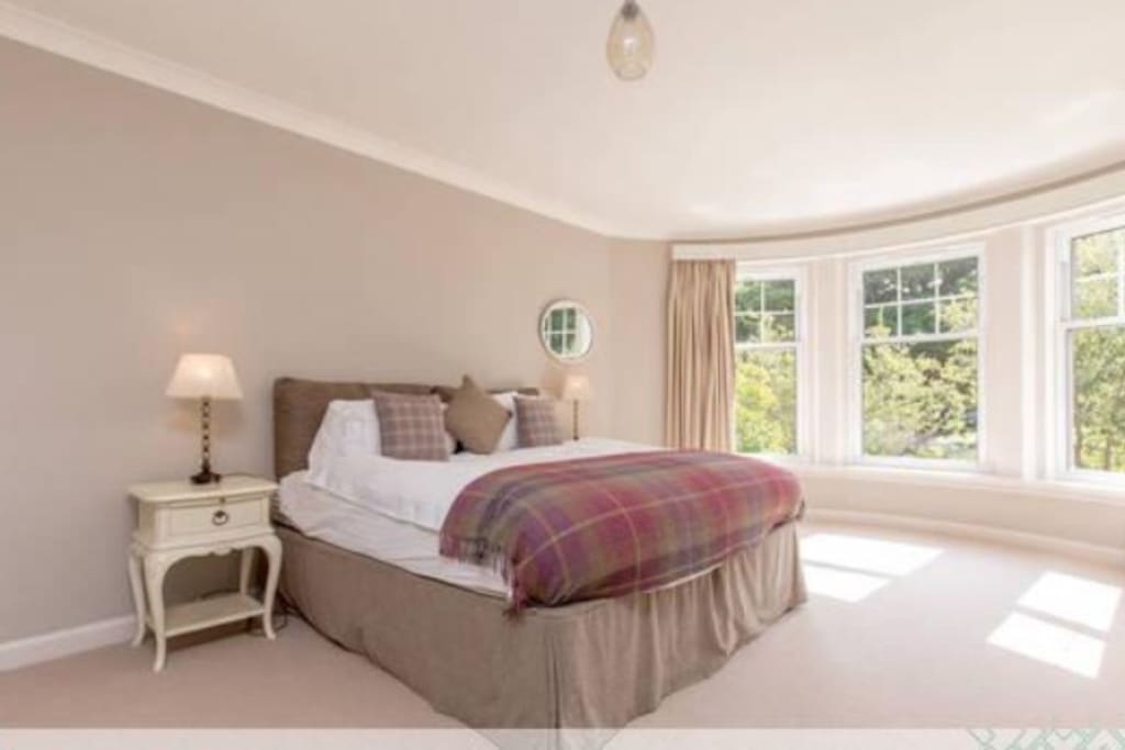 Master bedroom with super- king bed & overlooking the golf course