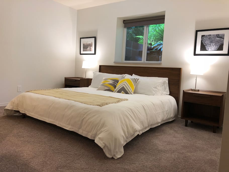 Gardenview bedroom with a king-size bed.