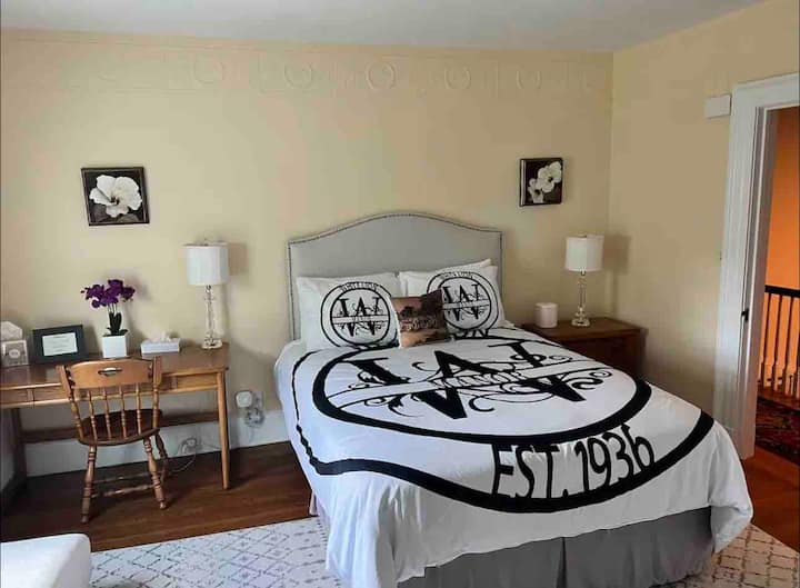 The Adora Suite (Queen Bed) With A Desk And Full Bathroom.