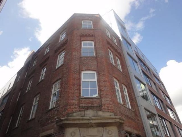Double bedroom in modern central apartment