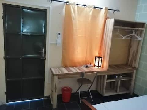 Quiet room with private toilet + air conditioning