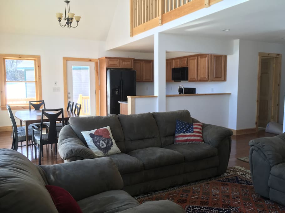 Include everyone in the conversation with the open area living space. Comfy couches to relax in after a long day or skiing or hiking.