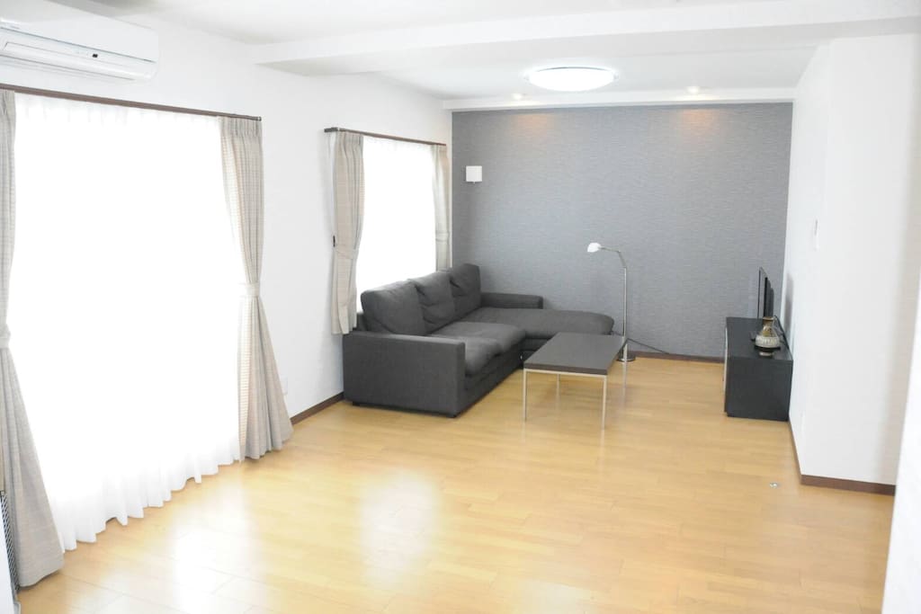 Living room with luxury sofa & TV