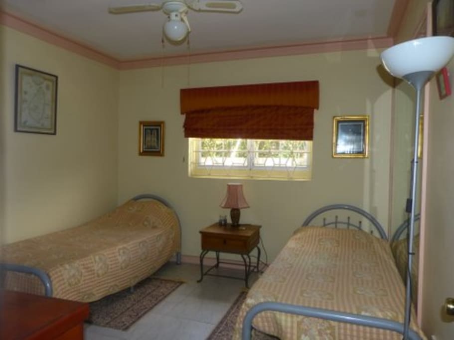 Twin Bedroom with large closet and en suite bathroom. No tv, hair dryer or iron
