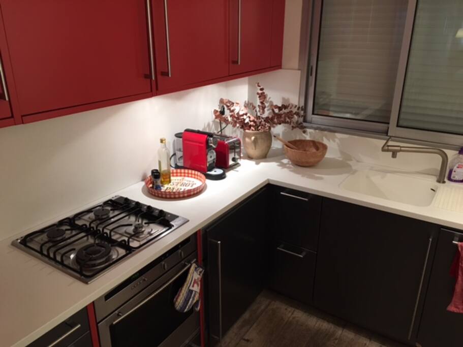 Our open kitchen with of course our Nespresso machine and a dish washer