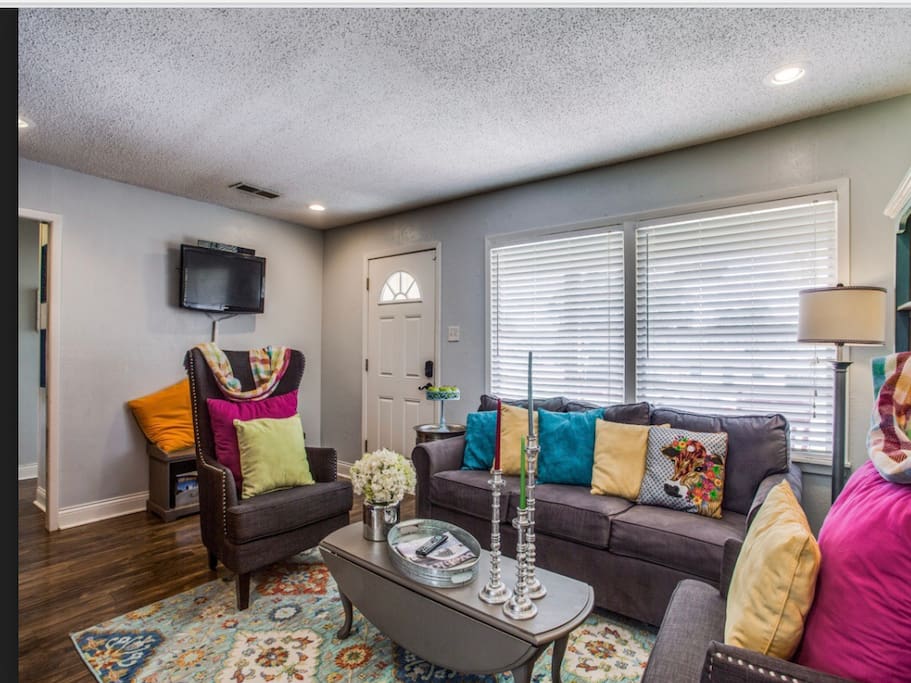 Welcome Home while in the Fort! Watch TV, catch up with friends, or play games in the bright and cheerful living room, which includes multiple areas of seating, full size sleeper sofa, and TV. Table also extends for dominoes and card games.