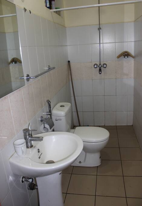 Guest washroom equipped with a shower