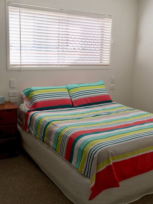Queen size bed with bamboo mattress topper... so comfortable