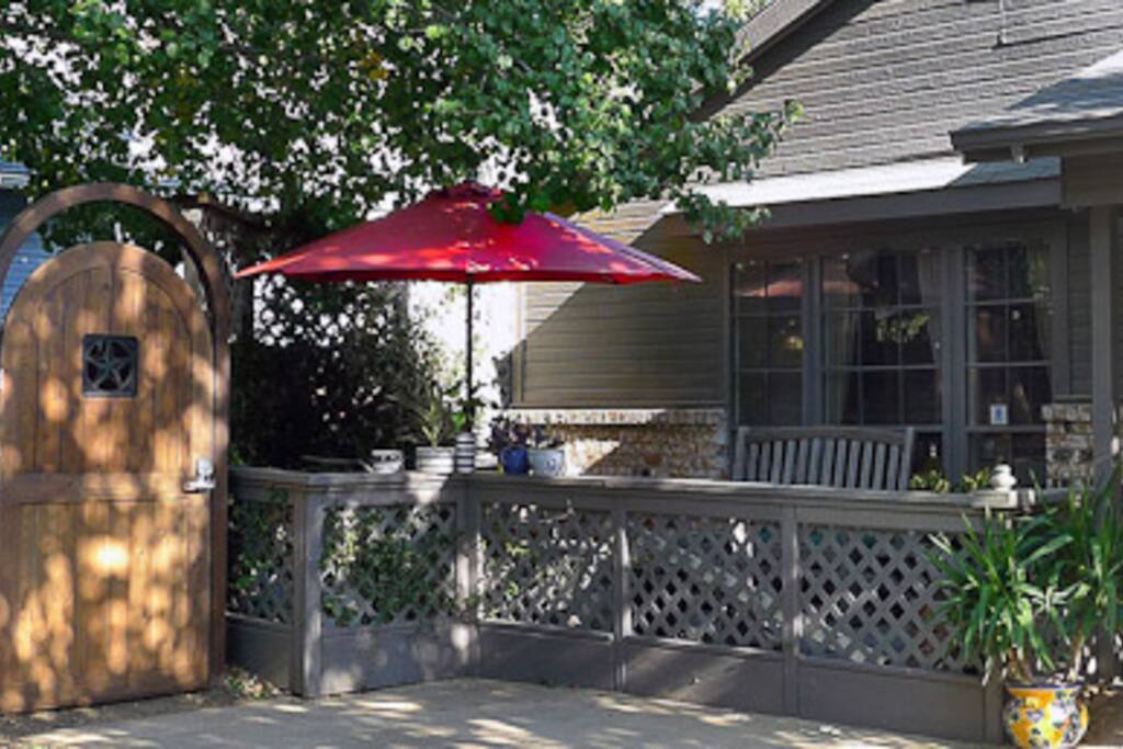 The gate on the left (which has a video intercom) leads to the apartment entrance at the side of the house