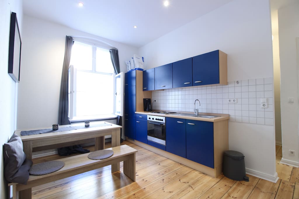 The fully equipped kitchen invites you to cook delicious meals.