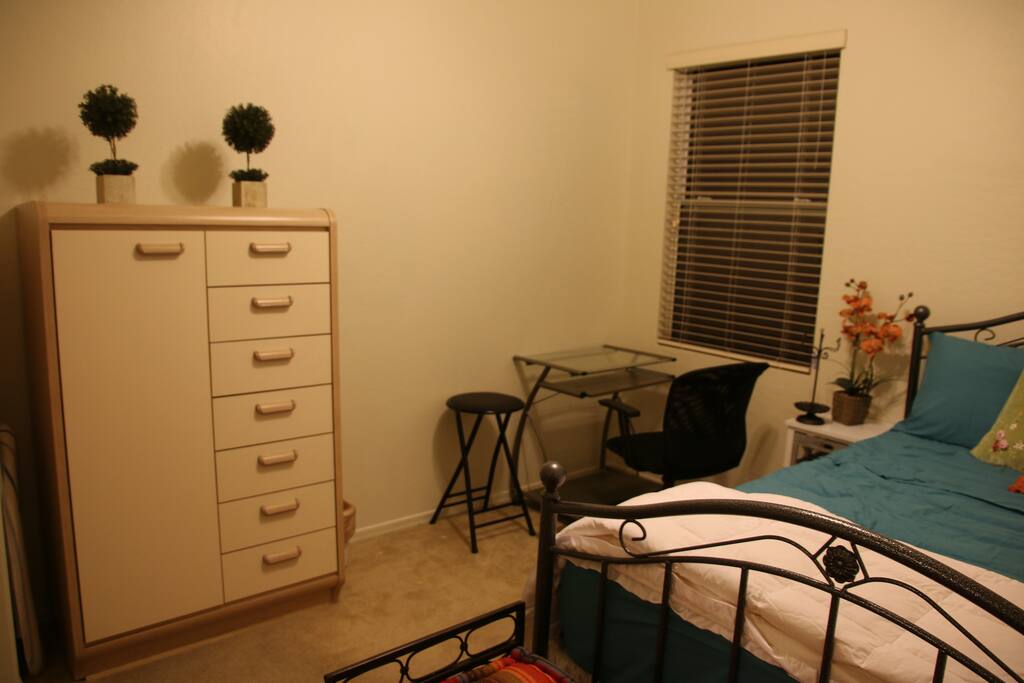 chest of drawers and computer desk