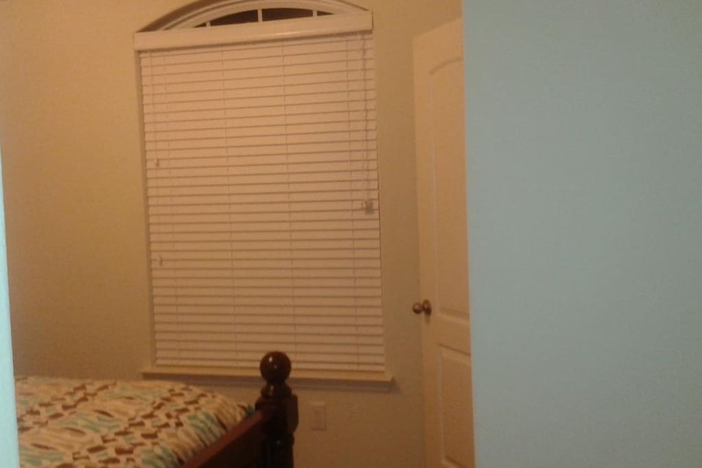 Bedroom with a front window