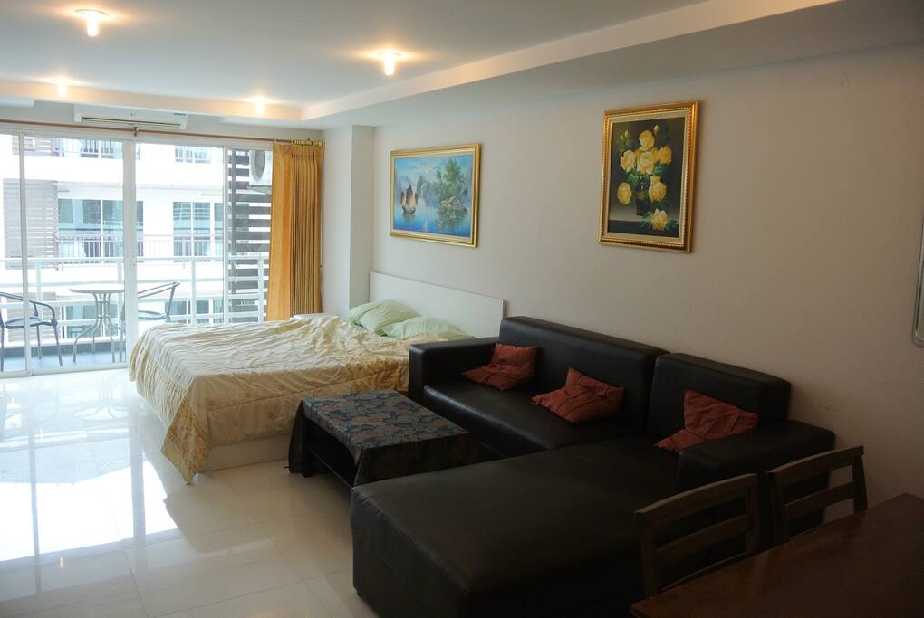 Living room with Sofa and Bed, this room has balcony.