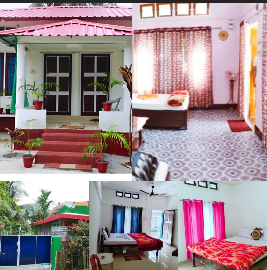 A welcoming exterior showcases a charming entrance flanked by potted plants and a red roof. The interior features a cozy sleeping area with neutral walls and patterned curtains. Multiple windows allow natural light to fill the room, highlighting the spacious layout and comfortable furnishings.