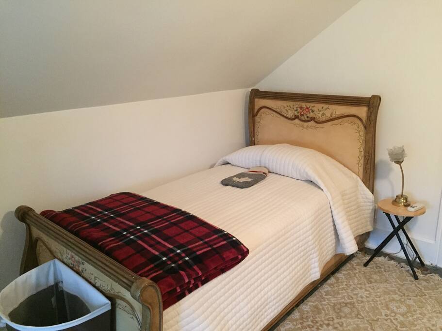 Single bed with pull out sofa bed in adjacent room.