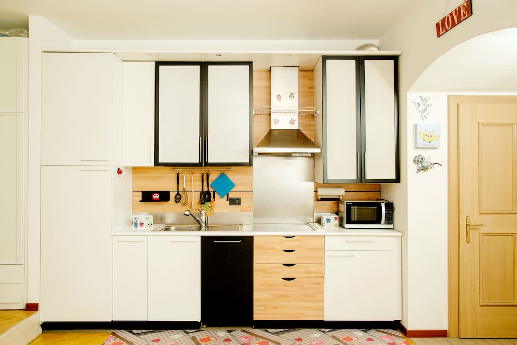 Kitchen with dishwasher and microwave