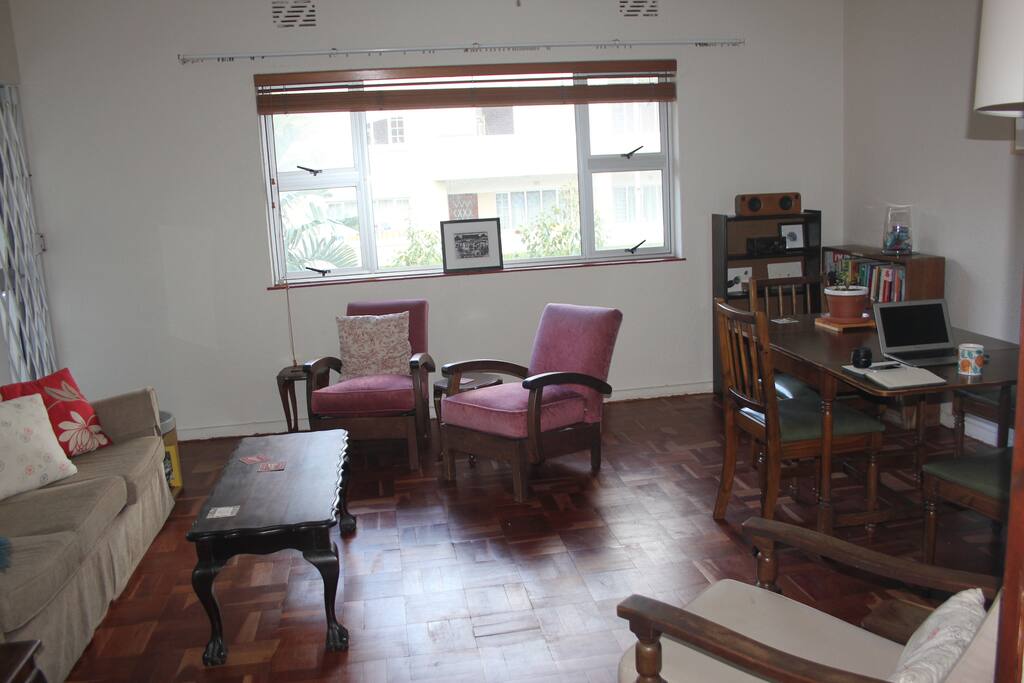 Open lounge/dinning area leading to balcony.