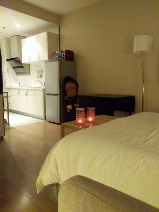 This shot taken from two cozy arm chairs on the right side of the bed (not pictured)