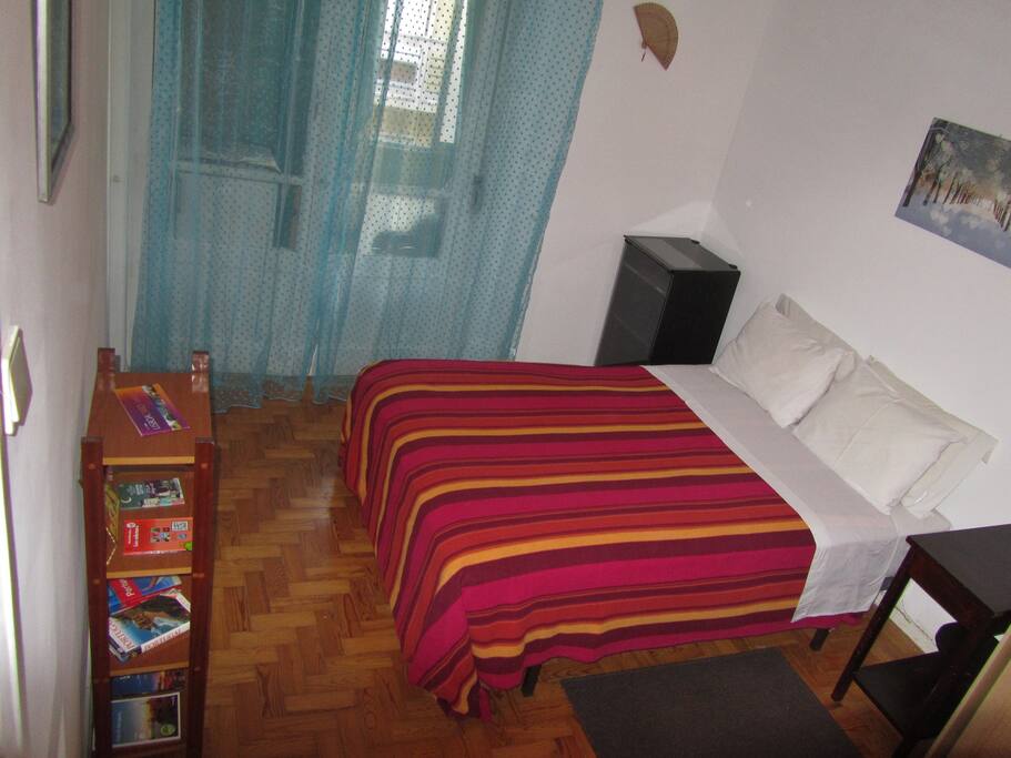 The bedroom with balcony